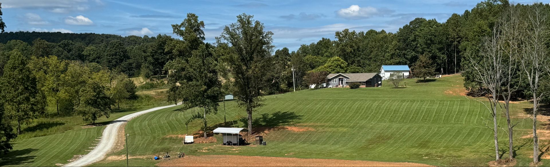 Freshly mowed and striped lawn in Hickory, NC by Oasis Property Management